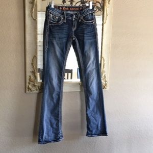 Rock Revival jeans. Donna boot cut. Distressed denim. Size 25.